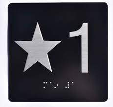 Black and metal Elevator Sign floor one with a star